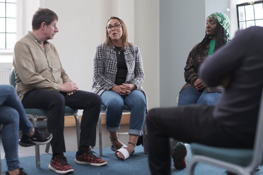 Woman talking in group session