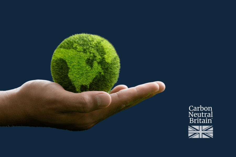 Carbon neutral britain logo with hand